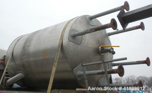 Used Lee Metal Products Tank, 1910 Gallon, 316 Stainless Steel, Vertical. 76" Diameter x 108" straight side, slight dish top, dished bottom. Openings: top (2) 18" manways with covers, (2) 3" sanitary...