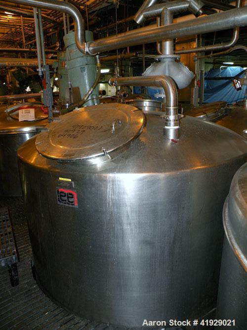 Used Lee Metal Products Tank, 2000 Gallon,  Stainless Steel, Vertical. 76" diameter x 106" straight side, dished top and bottom. Off center top entering Lightnin agitator, model N33G-300. 1-1/2" diam...