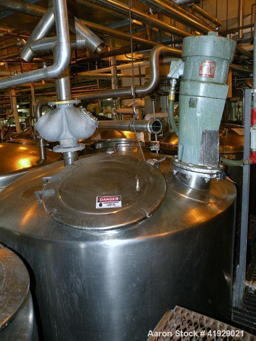 Used Lee Metal Products Tank, 2000 Gallon,  Stainless Steel, Vertical. 76" diameter x 106" straight side, dished top and bottom. Off center top entering Lightnin agitator, model N33G-300. 1-1/2" diam...