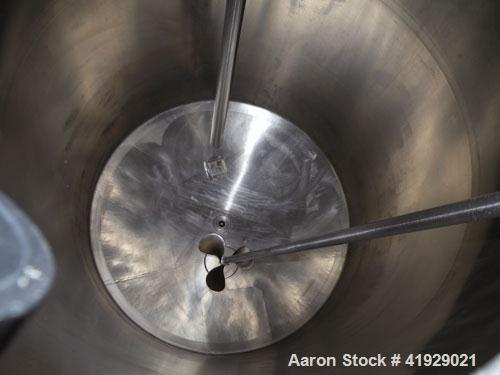 Used Lee Metal Products Tank, 2000 Gallon,  Stainless Steel, Vertical. 76" diameter x 106" straight side, dished top and bottom. Off center top entering Lightnin agitator, model N33G-300. 1-1/2" diam...