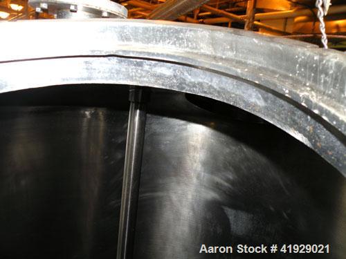 Used Lee Metal Products Tank, 2000 Gallon,  Stainless Steel, Vertical. 76" diameter x 106" straight side, dished top and bottom. Off center top entering Lightnin agitator, model N33G-300. 1-1/2" diam...