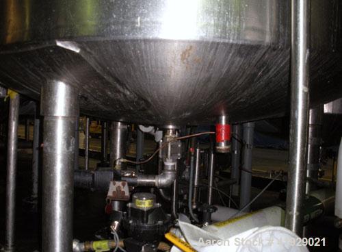 Used Lee Metal Products Tank, 2000 Gallon,  Stainless Steel, Vertical. 76" diameter x 106" straight side, dished top and bottom. Off center top entering Lightnin agitator, model N33G-300. 1-1/2" diam...