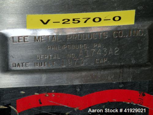 Used Lee Metal Products Tank, 2000 Gallon,  Stainless Steel, Vertical. 76" diameter x 106" straight side, dished top and bottom. Off center top entering Lightnin agitator, model N33G-300. 1-1/2" diam...
