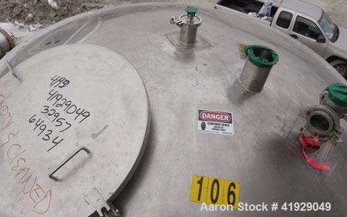 Used Lee Metal Products Tank, 2000 Gallon, 316 Stainless Steel, Vertical. 76" Diameter x 108" straight side, dished top and bottom. Openings: top (2) 3" tri-clamp, 4" vent, 22" manway with cover; 4" ...