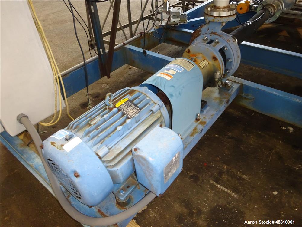 Used Murray Equipment Inc. Model MVP-10, 10 Ton Mixer.  2,500 Gallon, 96" diameter.   10 ga. 304 stainless steel cone bottom mix tank, mounted on mild steel frame. Tank has four 8" stainless baffles,...