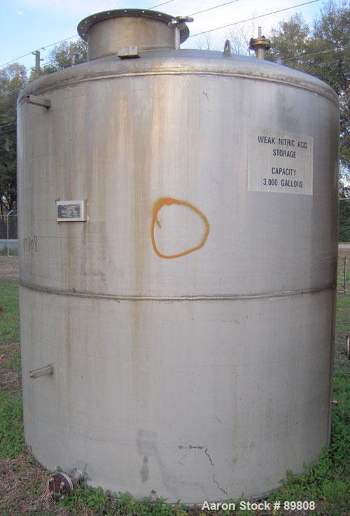 Used Metal Equipment Company Tank, 3,000 gallon, stainless steel, vertical. Approximate 96" diameter x 96" straight side. Dish top, flat bottom. Openings:  top (2) 2", 4", 1", 24" manway with no cove...