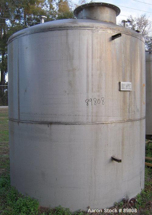 Used Metal Equipment Company Tank, 3,000 gallon, stainless steel, vertical. Approximate 96" diameter x 96" straight side. Dish top, flat bottom. Openings:  top (2) 2", 4", 1", 24" manway with no cove...