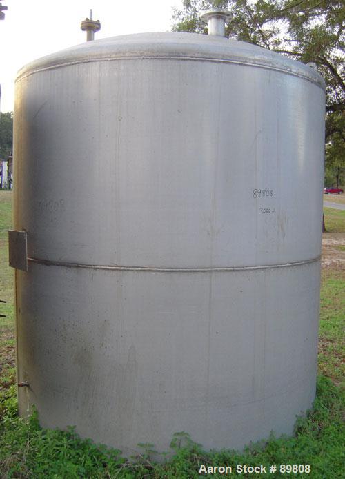 Used Metal Equipment Company Tank, 3,000 gallon, stainless steel, vertical. Approximate 96" diameter x 96" straight side. Dish top, flat bottom. Openings:  top (2) 2", 4", 1", 24" manway with no cove...