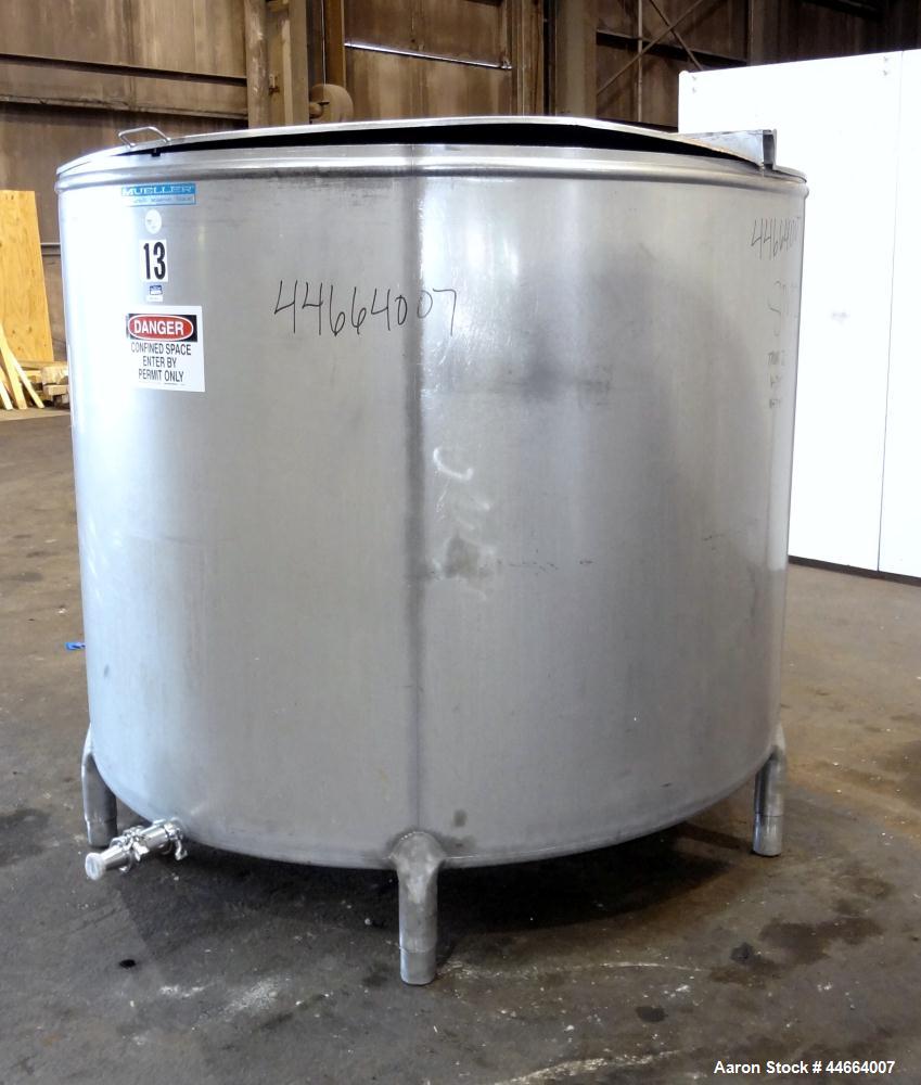 Used Mueller Tank, 1055 Gallon, 304 Stainless Steel, Vertical. Approximate 76" Diameter x 57” straight side, open top with (2) covers, inverted dish bottom. Side bottom entering agitator with a (3) b...
