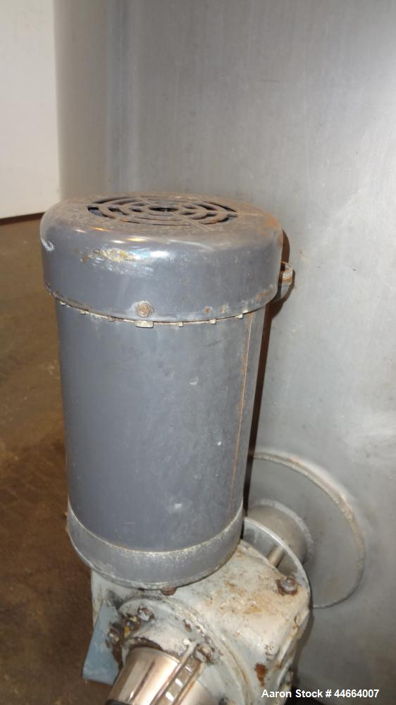Used Mueller Tank, 1055 Gallon, 304 Stainless Steel, Vertical. Approximate 76" Diameter x 57” straight side, open top with (2) covers, inverted dish bottom. Side bottom entering agitator with a (3) b...