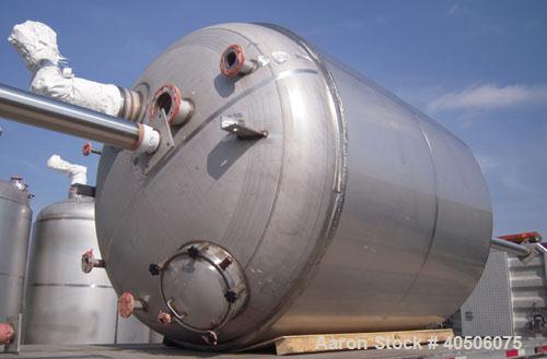 Unused- Mueller Pressure Tank, 2,500 Gallon, Model "F", 304L Stainless steel, Vertical. 90" diameter x 79" straight side, 2:1 elliptical top and bottom. Equipped with a 2 HP agitator.  Serial #357210...