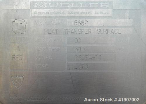 Used Mueller Tank, 2000 Gallon, Model F, 316 stainless steel, vertical. 84" diameter x 76" straight side, dished top and bottom. Insulated with 2" urethane and stainless steel sheathing. (4) Fixed si...