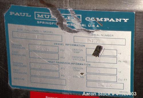 Used Mueller Tank, 2000 Gallon, Model F, Stainless Steel, Vertical. 76" diameter x 106" straight side, dished top and bottom. Openings top (3) 3" tri-clamp, 4" vent, 8" drive (capped), 24" manway wit...