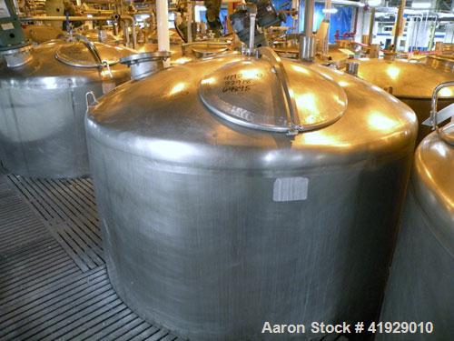 Used Mueller Tank, 2000 Gallon, Model F, Stainless Steel, Vertical. 76" diameter x 106" straight side, dished top and bottom. Openings top 2" tri-clamp, 3" tri-clamp, 4" vent, 8" drive (capped), (2) ...