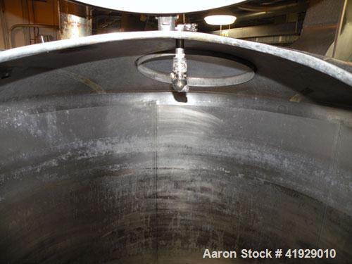 Used Mueller Tank, 2000 Gallon, Model F, Stainless Steel, Vertical. 76" diameter x 106" straight side, dished top and bottom. Openings top 2" tri-clamp, 3" tri-clamp, 4" vent, 8" drive (capped), (2) ...