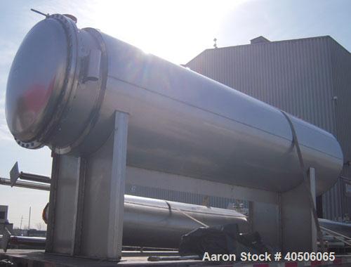 Unused- Mueller Coalescer Pressure Tank, 1600 Gallon, Model "H", 304L stainless steel, horizontal. 48" diameter x 204" straight side, (1) dished bolt on end with davit arm, (1) dished end. Internal r...