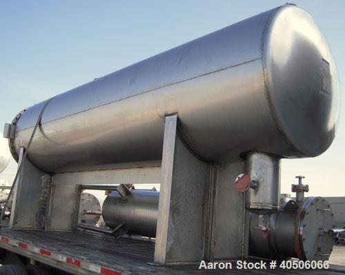 Unused- Mueller Coalescer Pressure Tank, 1600 Gallon, Model "H", 304L stainless steel, horizontal. 48" diameter x 204" straight side, (1) dished bolt on end with davit arm, (1) dished end. Internal r...