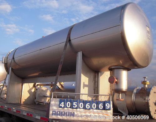 Unused- Mueller Coalescer Pressure Tank, 1600 Gallon, Model "H", 304L stainless steel, horizontal. 48" diameter x 204" straight side, (1) dished bolt on end with davit arm, (1) dished end. Internal r...