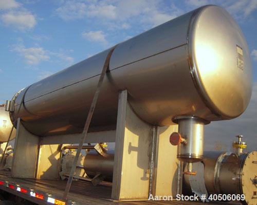 Unused- Mueller Coalescer Pressure Tank, 1600 Gallon, Model "H", 304L stainless steel, horizontal. 48" diameter x 204" straight side, (1) dished bolt on end with davit arm, (1) dished end. Internal r...