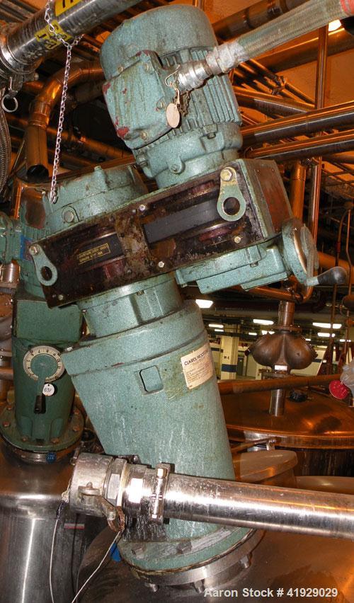 Used Mueller Tank, 2000 Gallon, Model F, 316 Stainless Steel, Vertical. 76" diameter x 106" straight side, dished top and bottom. Off center top entering angled Lightnin manual variable speed agitato...