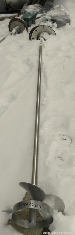 Used Mueller Tank, 2000 Gallon, Model F, 316 Stainless Steel, Vertical. 76" diameter x 106" straight side, dished top and bottom. Off center top entering angled Lightnin manual variable speed agitato...