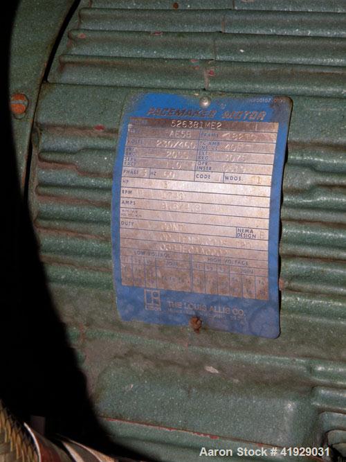 Used Mueller Tank, 2000 Gallon, Model F, Stainless Steel, Vertical. 76" diameter x 106" straight side, dished top and bottom. Off center top entering angled Lightnin manual variable speed agitator, m...