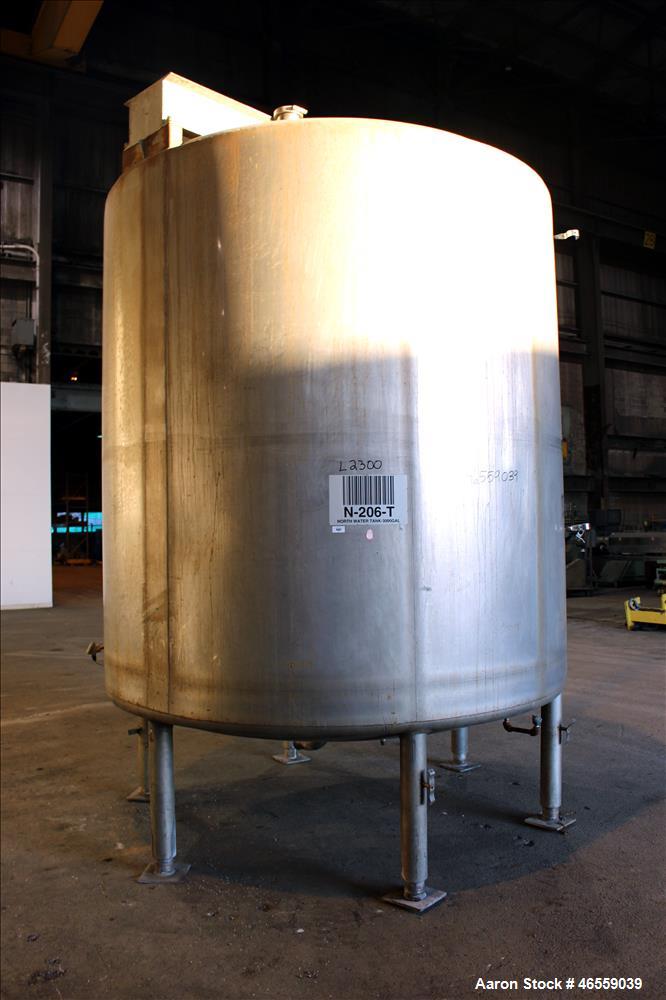Used Mueller Tank, Approximate 3,500 Gallon, 304 Stainless Steel, Vertical. 304 Stainless steel jacket. Approximate 96" diameter x 102" straight side. Flat welded top, dished bottom. Openings top: 30...