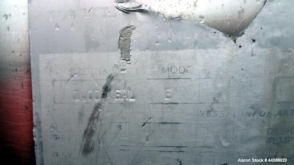 Used Mueller Tank, 1000 Gallons, 316 Stainless Steel, Vertical.  Approximately 76" diameter x 57" straight side, open top with (2) covers, sloped bottom.  (2) Lightnin clamp-on agitators.  (1) Model ...
