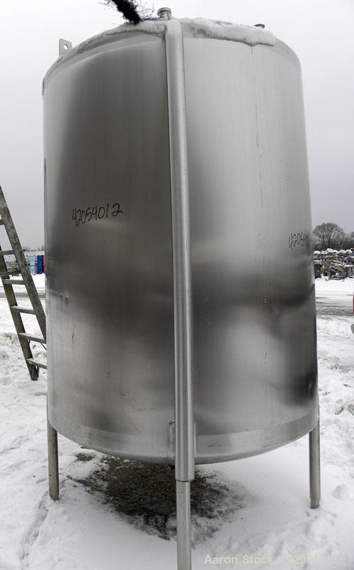 Used Lake Process Systems Tank, 1000 Gallon, Model LPS-1000, 304 Stainless Steel, Vertical. 60" diameter x 72" straight side, dish top and bottom. (1) Spray ball. Openings top (3) 2", 1-1/2", 19" man...