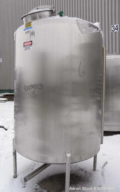 Used Lake Process Systems Tank, 1000 Gallon, Model LPS-1000, 304 Stainless Steel, Vertical. 60" diameter x 72" straight side, dish top and bottom. (1) Spray ball. Openings top (3) 2", 1-1/2", 19" man...