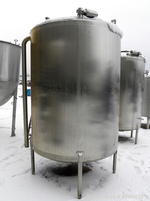Used Lake Process Systems Tank, 1000 Gallon, Model LPS-1000, 304 Stainless Steel, Vertical. 60" diameter x 72" straight side, dish top and bottom. (1) Spray ball. Openings top (3) 2", 1-1/2", 19" man...