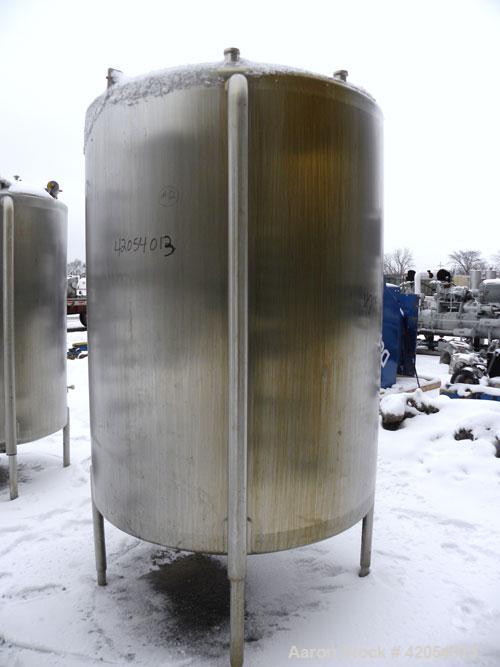 Used Lake Process Systems Tank, 1000 Gallon, Model LPS-1000, 304 Stainless Steel, Vertical. 60" diameter x 72" straight side, dish top and bottom. (1) Spray ball. Openings top (3) 2", 1-1/2", 19" man...