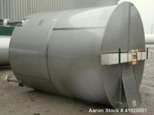 Used Tank, 4200 Gallon, 304 Stainless Steel, Vertical. 100" diameter x 120" straight side, flat open top with a bolt on cover with a hinged access door, coned bottom. Bolt on carbon steel agitator br...