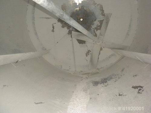 Used Tank, 4200 Gallon, 304 Stainless Steel, Vertical. 100" diameter x 120" straight side, flat open top with a bolt on cover with a hinged access door, coned bottom. Bolt on carbon steel agitator br...