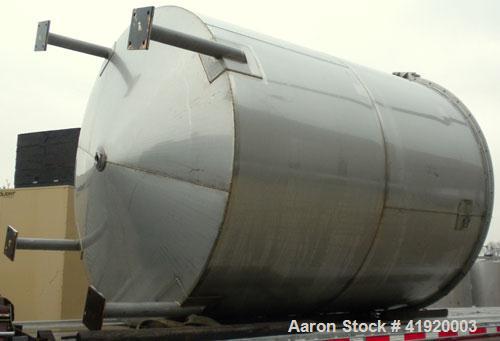 Used Tank, 4200 Gallon, 304 Stainless Steel, Vertical. 100" diameter x 120" straight side, flat open top with a bolt on cover with a hinged access door, coned bottom. Bolt on carbon steel agitator br...