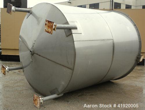 Used Tank, 4200 Gallon, 304 Stainless Steel, Vertical. 100" diameter x 120" straight side, flat open top with a bolt on cover with a hinged access door, coned bottom. Bolt on carbon steel agitator br...