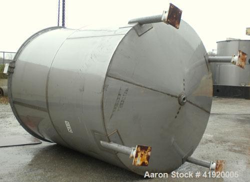 Used Tank, 4200 Gallon, 304 Stainless Steel, Vertical. 100" diameter x 120" straight side, flat open top with a bolt on cover with a hinged access door, coned bottom. Bolt on carbon steel agitator br...