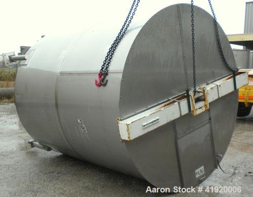 Used Tank, 4200 Gallon, 304 Stainless Steel, Vertical. 100" diameter x 120" straight side, flat open top with a bolt on cover with a hinged access door, coned bottom. Bolt on carbon steel agitator br...