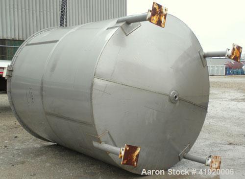 Used Tank, 4200 Gallon, 304 Stainless Steel, Vertical. 100" diameter x 120" straight side, flat open top with a bolt on cover with a hinged access door, coned bottom. Bolt on carbon steel agitator br...