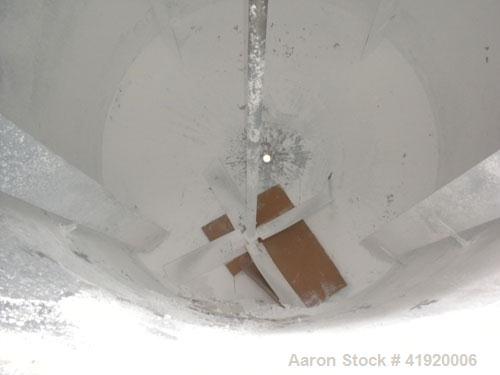 Used Tank, 4200 Gallon, 304 Stainless Steel, Vertical. 100" diameter x 120" straight side, flat open top with a bolt on cover with a hinged access door, coned bottom. Bolt on carbon steel agitator br...