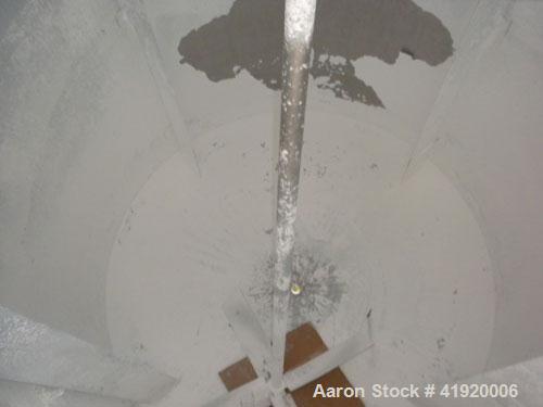 Used Tank, 4200 Gallon, 304 Stainless Steel, Vertical. 100" diameter x 120" straight side, flat open top with a bolt on cover with a hinged access door, coned bottom. Bolt on carbon steel agitator br...
