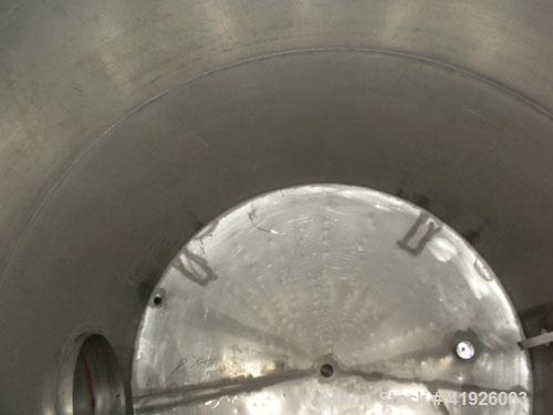 Used Tank, 2800 Gallon, 316 Stainless Steel, Vertical. 84" diameter x 116" straight side, slight cone top, coned bottom. Openings: top (2) 3"; side 24" manway with bolt on cover; 3-1/2" NPT center bo...