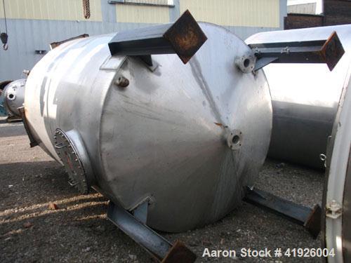 Used- Tank, 2800 Gallon, 316 Stainless Steel, Vertical. 84" diameter x 116" straight side, coned top and bottom. Openings: t...