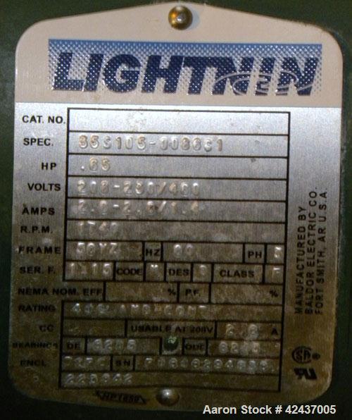 Used Tank, 1075 Gallon, 304 Stainless Steel, Vertical. 72" Diameter x 60" straight side, dished top and bottom. Off center top entering Lightnin agitator, model XJC-65. Approximate 1-1/2" diameter sh...
