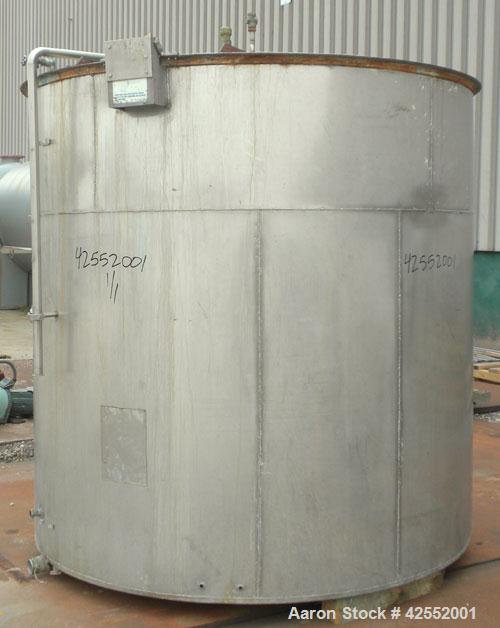 Used Tank, 2000 Gallon, 304 Stainless Steel, Vertical. 84" Diameter x 81" straight side. Flat welded top, sloped bottom, with custom made sparge ring. (1) Spray ball. Openings: top (2) 1", 1-1/2", 2-...