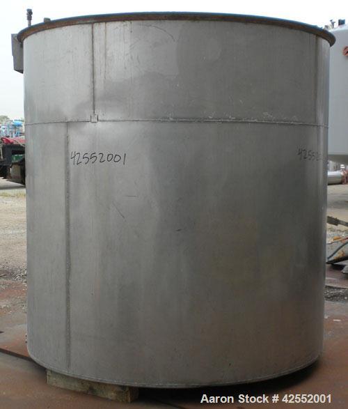 Used Tank, 2000 Gallon, 304 Stainless Steel, Vertical. 84" Diameter x 81" straight side. Flat welded top, sloped bottom, with custom made sparge ring. (1) Spray ball. Openings: top (2) 1", 1-1/2", 2-...