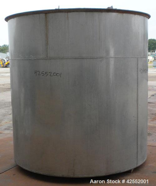 Used Tank, 2000 Gallon, 304 Stainless Steel, Vertical. 84" Diameter x 81" straight side. Flat welded top, sloped bottom, with custom made sparge ring. (1) Spray ball. Openings: top (2) 1", 1-1/2", 2-...