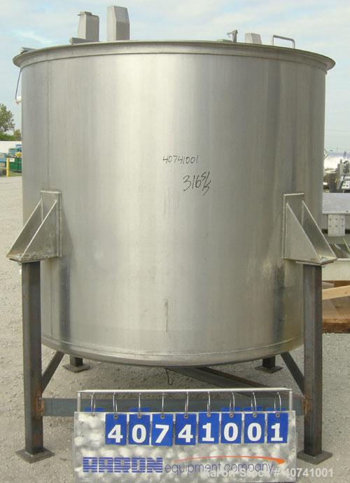 Used Tank, 1200 gallon, 316 stainless steel, vertical. 72" diameter x 62" straight side. Open top with (2) 1/3 covers, dished bottom. Provision for a clamp-on agitator. 3 1/2" center bottom outlet. M...