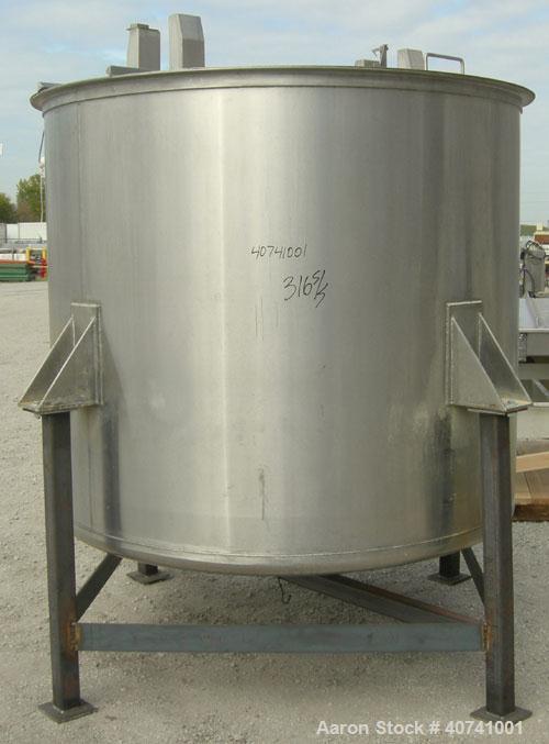 Used Tank, 1200 gallon, 316 stainless steel, vertical. 72" diameter x 62" straight side. Open top with (2) 1/3 covers, dished bottom. Provision for a clamp-on agitator. 3 1/2" center bottom outlet. M...