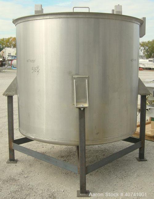 Used Tank, 1200 gallon, 316 stainless steel, vertical. 72" diameter x 62" straight side. Open top with (2) 1/3 covers, dished bottom. Provision for a clamp-on agitator. 3 1/2" center bottom outlet. M...